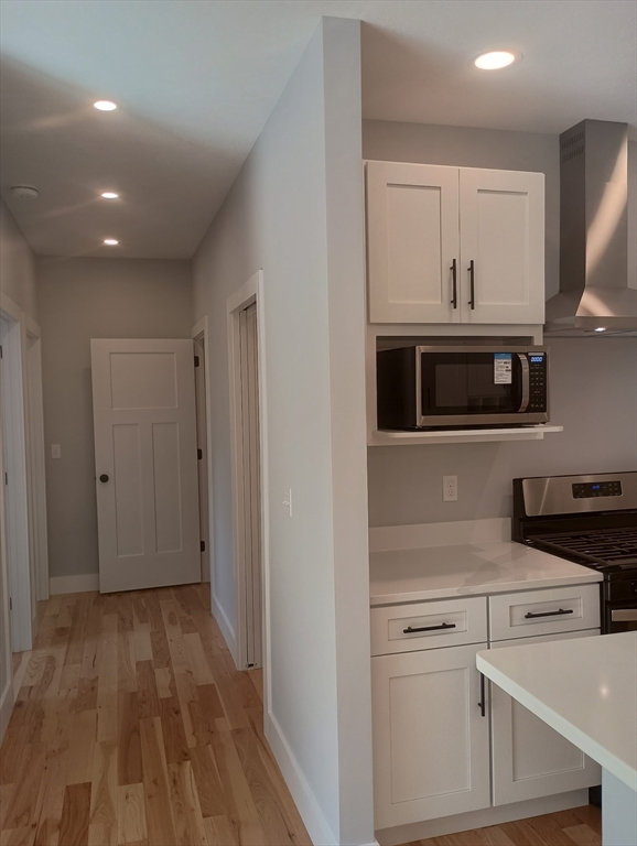 73 Depot Road Leverett, MA 01054 - Photo 25 of 39 a kitchen with stainless steel appliances granite countertop a stove and a sink