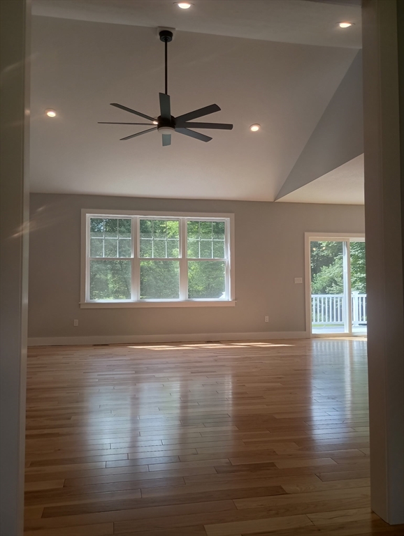 73 Depot Road Leverett, MA 01054 - Photo 27 of 39 a view of an empty room with wooden floor and a window
