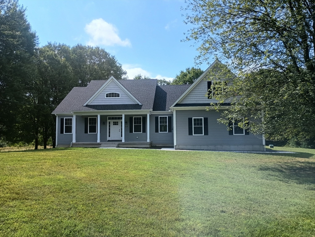 73 Depot Road Leverett, MA 01054 - Photo 3 of 39 a front view of a house with a garden