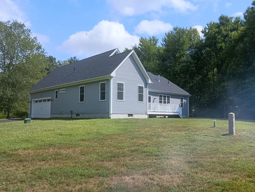 73 Depot Road Leverett, MA 01054 - Photo 6 of 39 a house that has a big yard and large trees