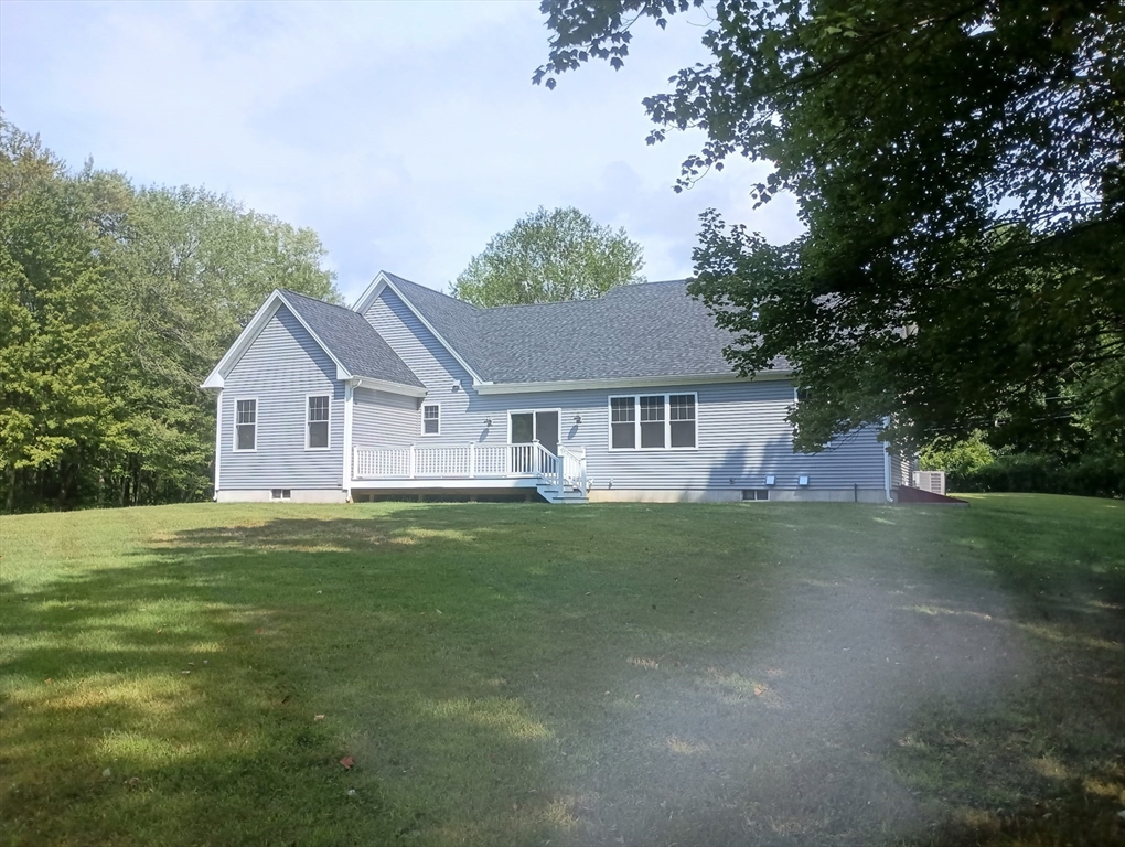 73 Depot Road Leverett, MA 01054 - Photo 8 of 39 a front view of a house with a garden