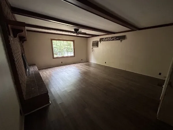 a view of empty room with windows