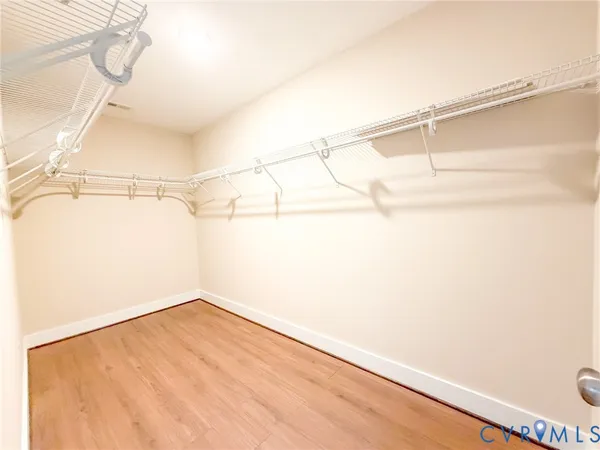 a view of a room with racks on the wall