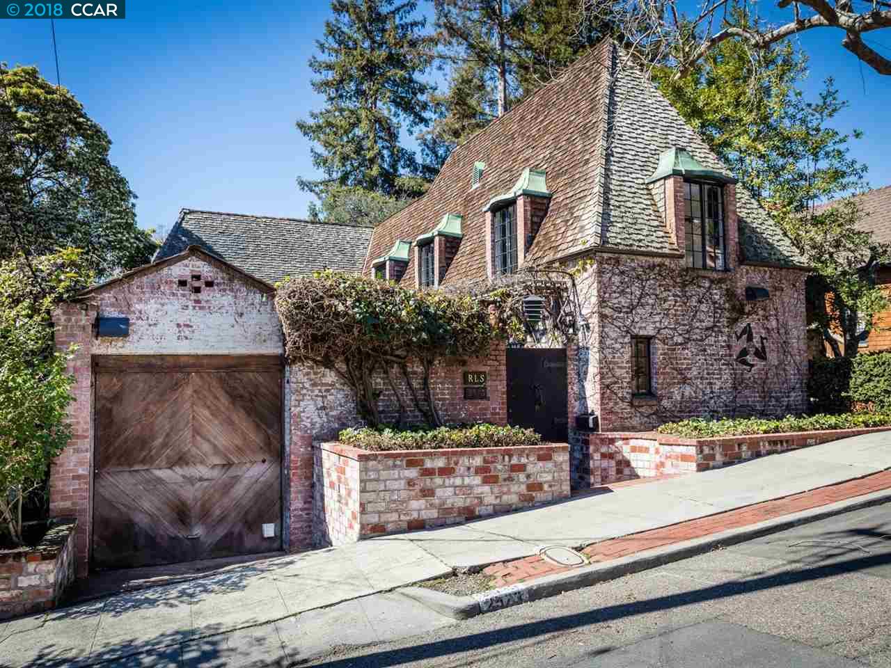 a view of house with street sign