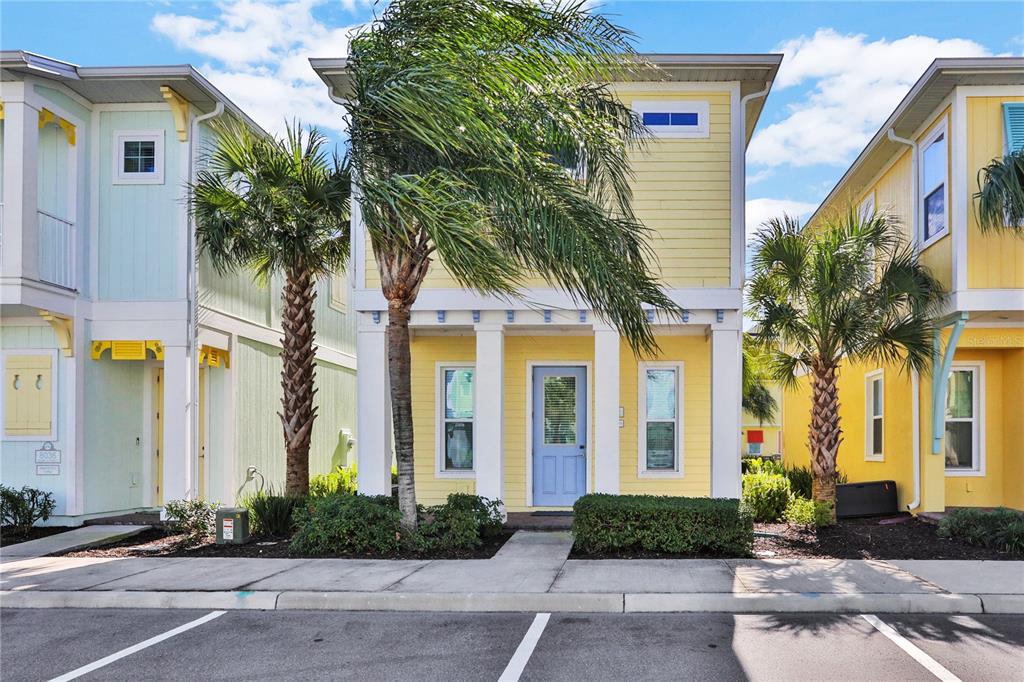 8038 Surf Street Kissimmee, FL 34747 - Photo 21 of 81 a front view of a house with a yard