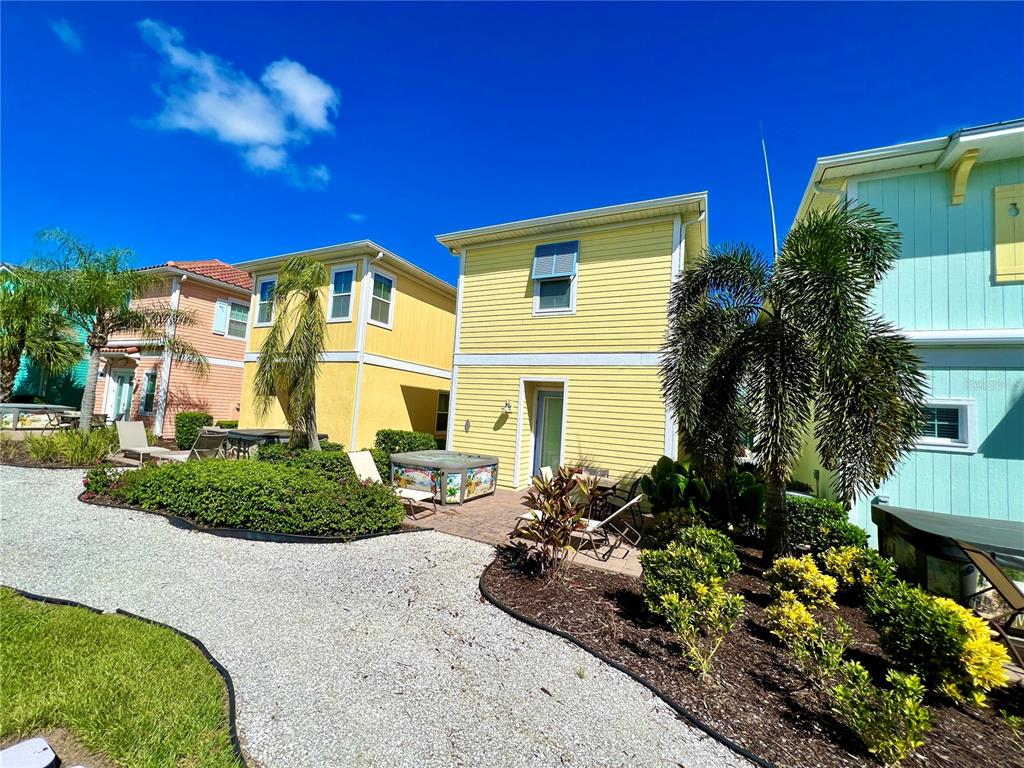 8038 Surf Street Kissimmee, FL 34747 - Photo 26 of 81 a front view of a house with a yard