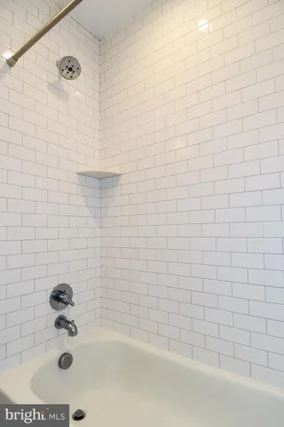 a bathroom with a bathtub