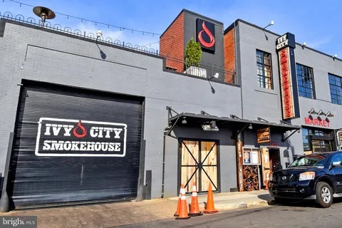 a view of building with a sign broad