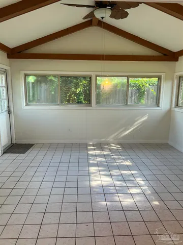 a view of a room with a large window