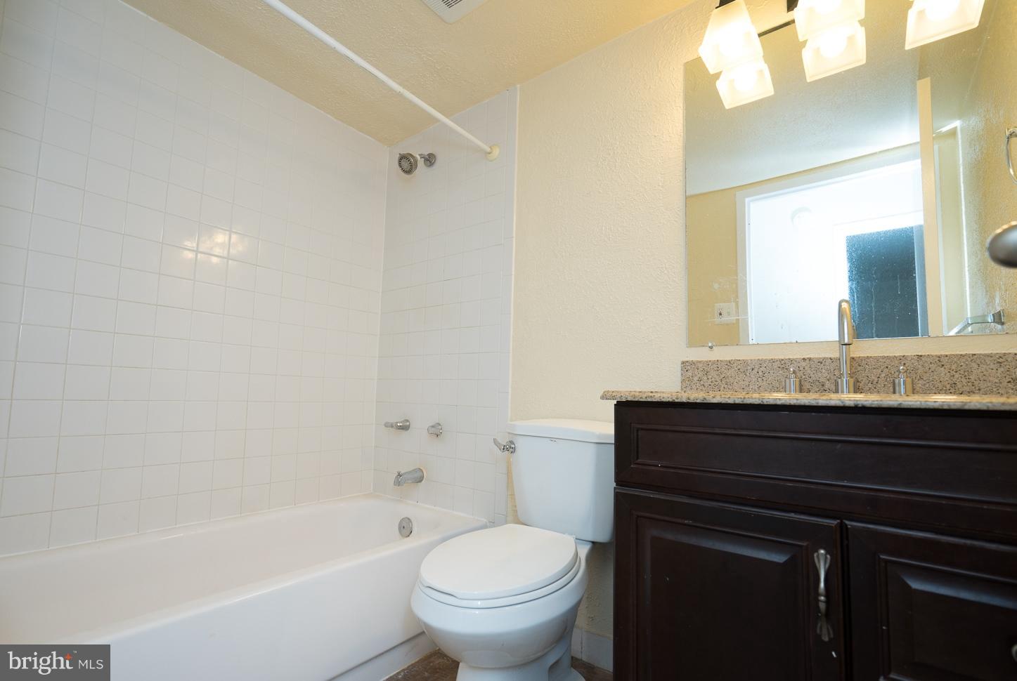 11216 Chestnut Grove Square, Unit 119 Reston, VA 20190 - Photo 15 of 16 Hallway Bathroom