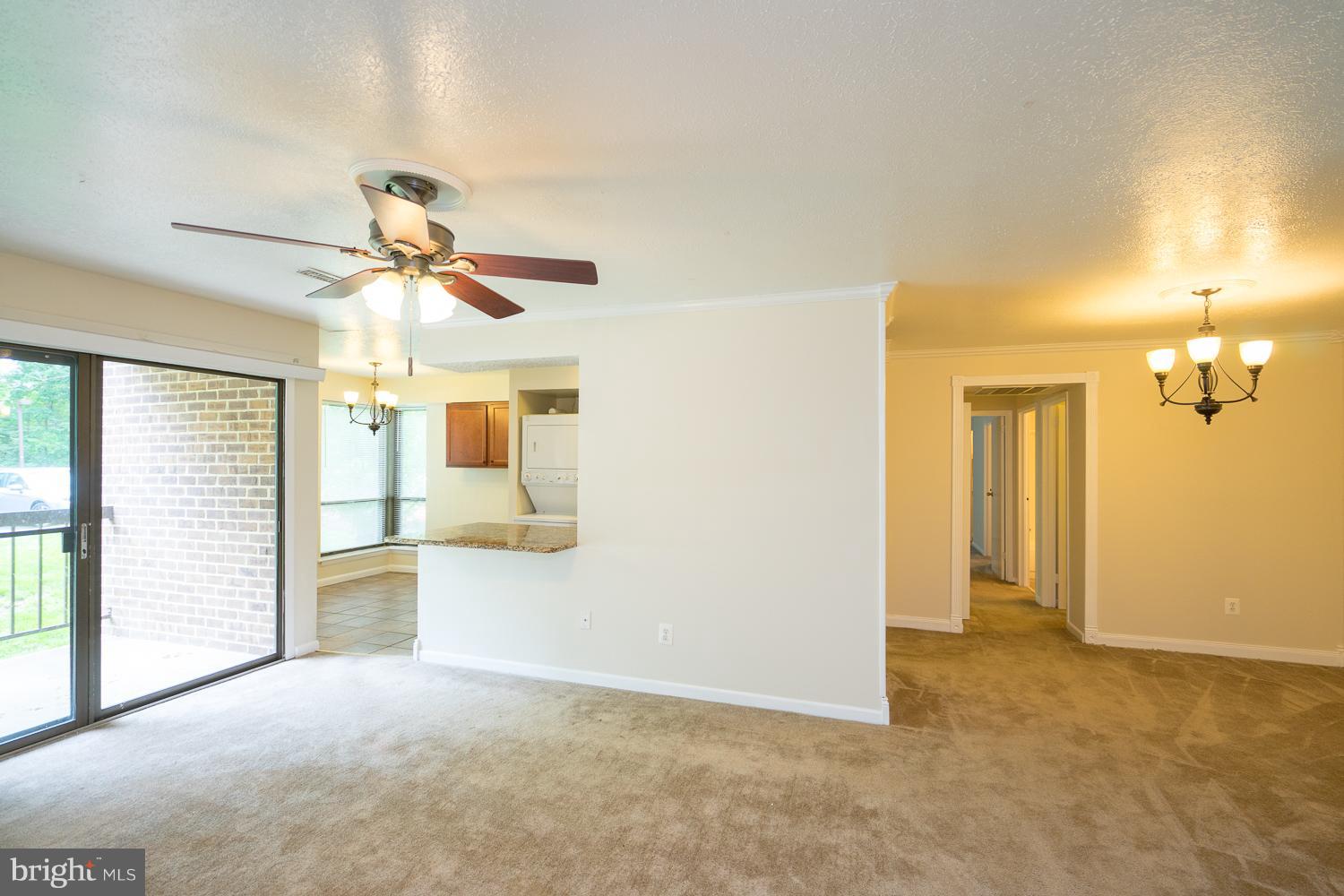 11216 Chestnut Grove Square, Unit 119 Reston, VA 20190 - Photo 5 of 16 Open Bright, Spacious Living Room