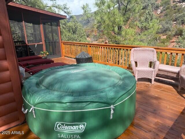 5579 Solitude Trail Loop Pine, AZ 85544 - Photo 8 of 50 a backyard of a house with table and chairs