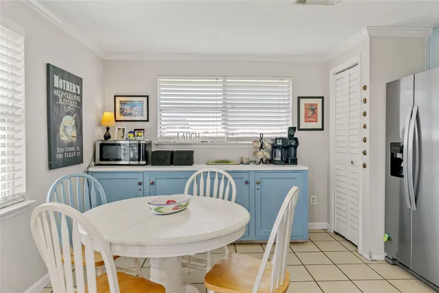 a bedroom with a bed and a lamp