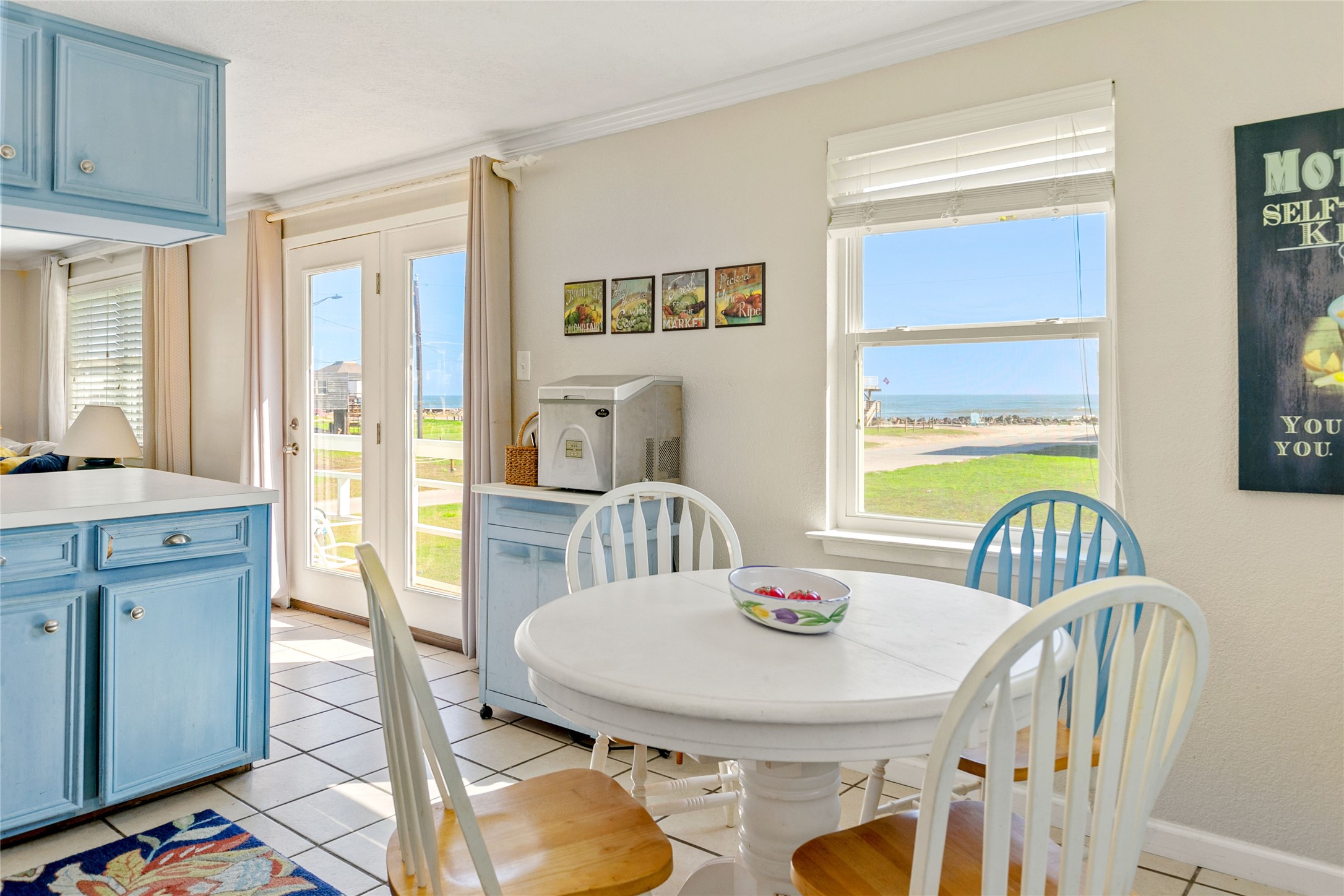 12911 Jolly Roger Drive Freeport, TX 77541 - Photo 14 of 41 a view of a dining room with furniture