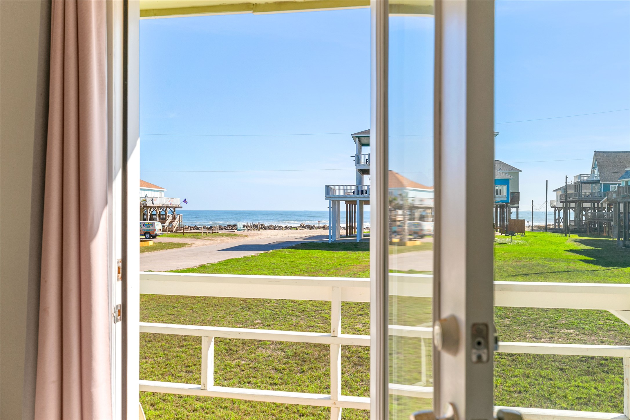 12911 Jolly Roger Drive Freeport, TX 77541 - Photo 16 of 41 a view of a city from a living room