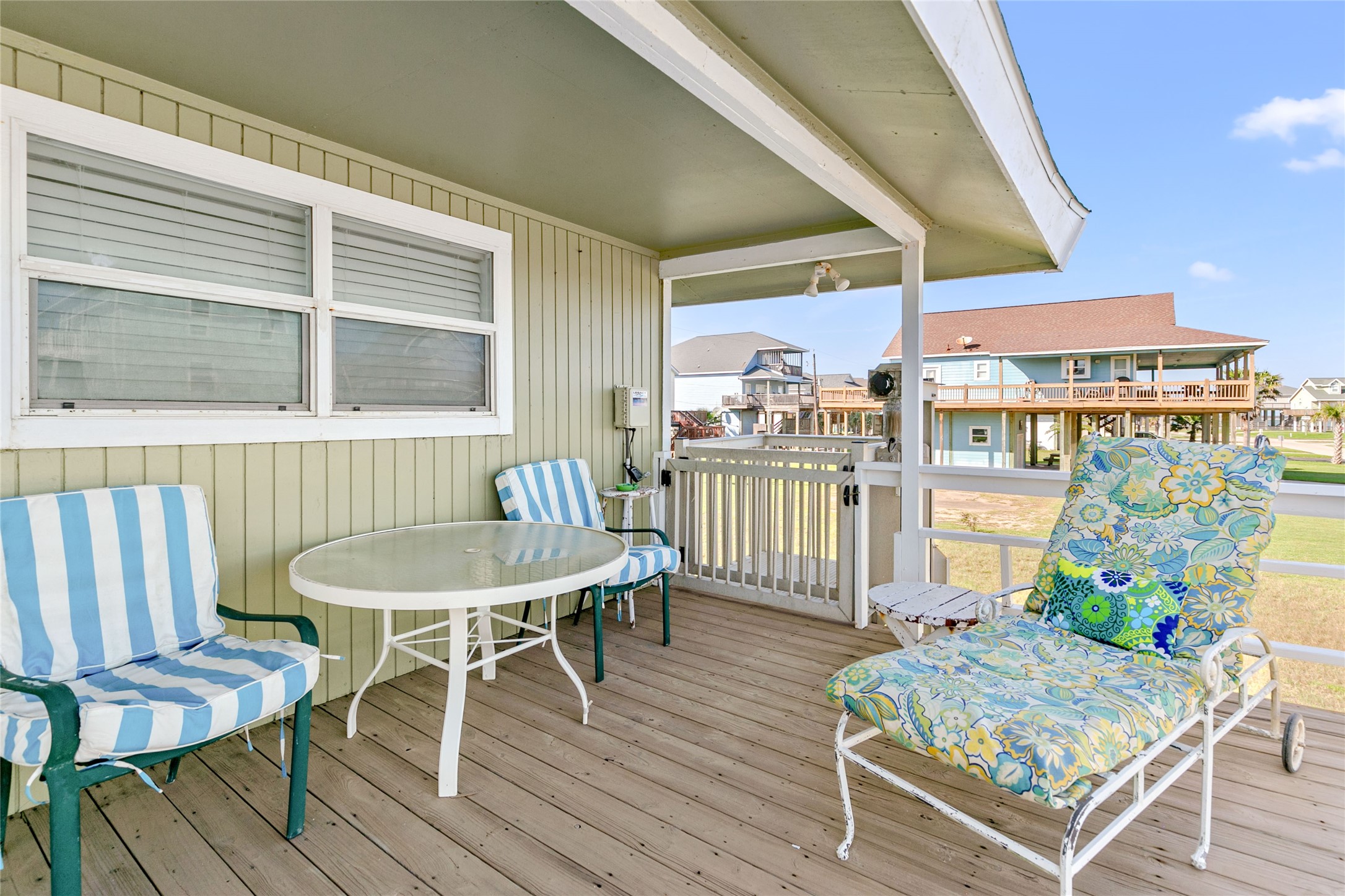 12911 Jolly Roger Drive Freeport, TX 77541 - Photo 30 of 41 a living room with furniture and wooden floor