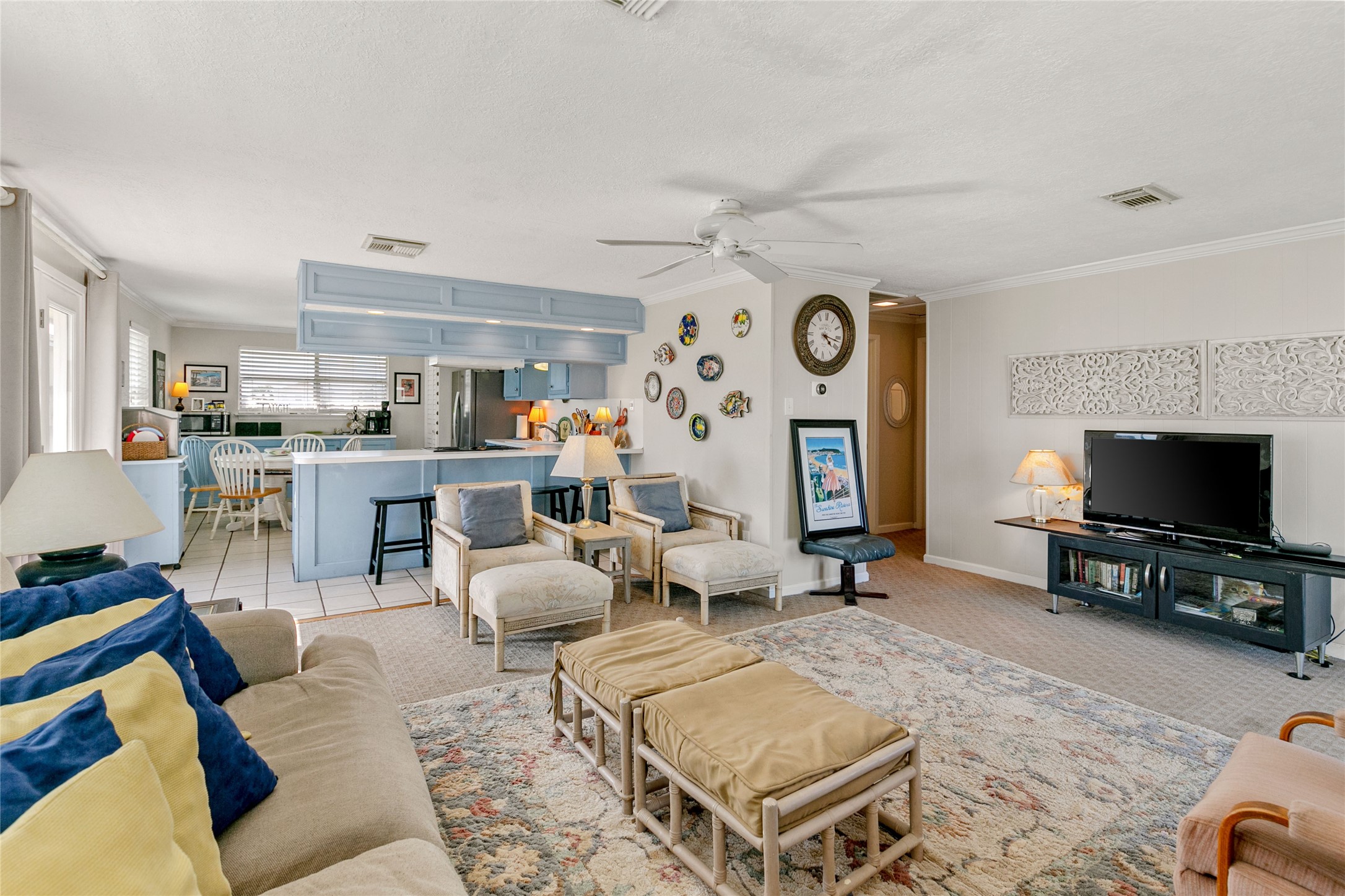 12911 Jolly Roger Drive Freeport, TX 77541 - Photo 10 of 41 a living room with furniture and a flat screen tv