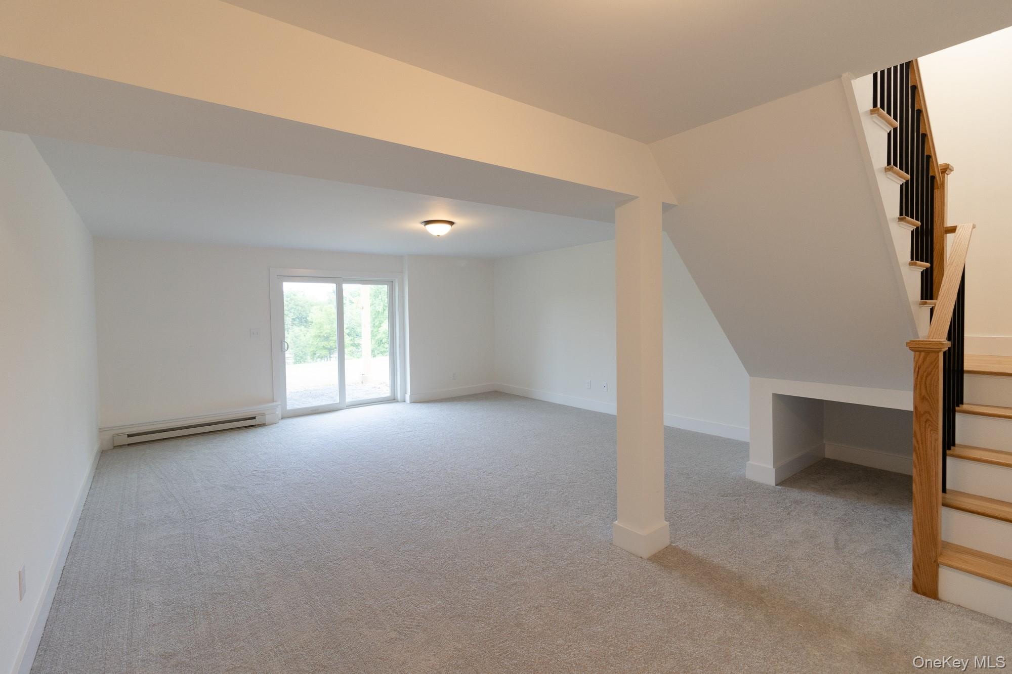 750 Ridgebury Road Slate Hill, NY 10973 - Photo 18 of 41 a view of an empty room with a window