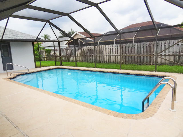 18255 181st Circle South Boca Raton, FL 33498 - Photo 11 of 20 LARGE POOL IN SCREENED PATIO