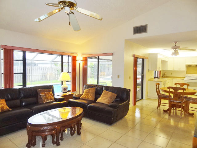 18255 181st Circle South Boca Raton, FL 33498 - Photo 12 of 20 FAMILY ROOM OVERLOOKING POOL