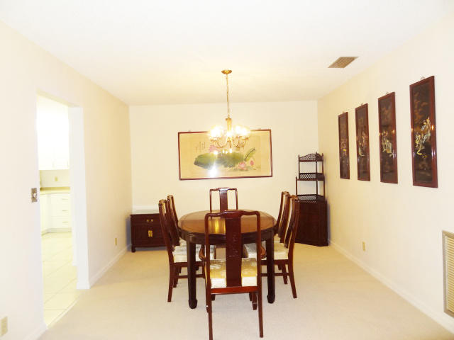 18255 181st Circle South Boca Raton, FL 33498 - Photo 13 of 20 FORMAL DINING ROOM W/ KITCHEN ACCESS