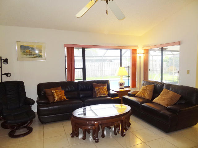 18255 181st Circle South Boca Raton, FL 33498 - Photo 5 of 20 FAMILY ROOM OVERLOOKING POOL