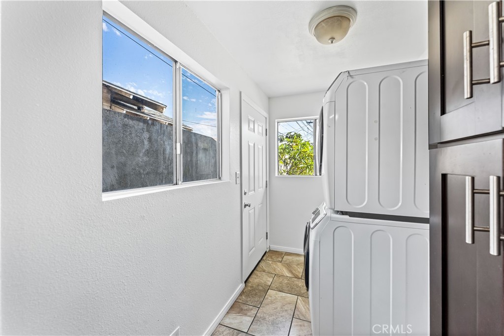 1178 Spence Street Los Angeles, CA 90023 - Photo 19 of 36 a view of walk in closet
