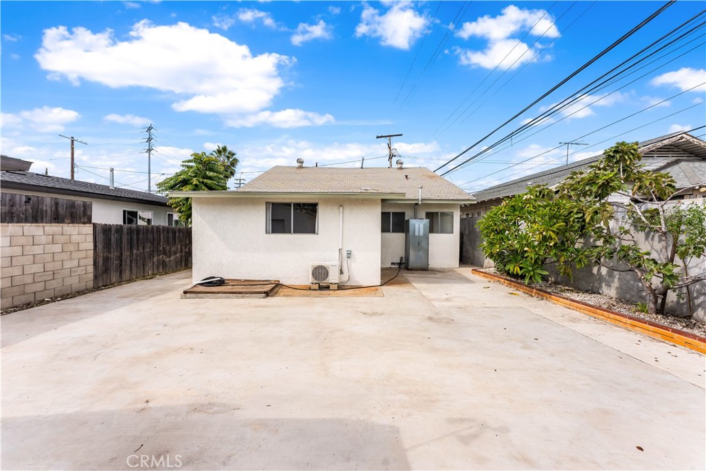 1178 Spence Street Los Angeles, CA 90023 - Photo 23 of 36 a view of a white house with a patio