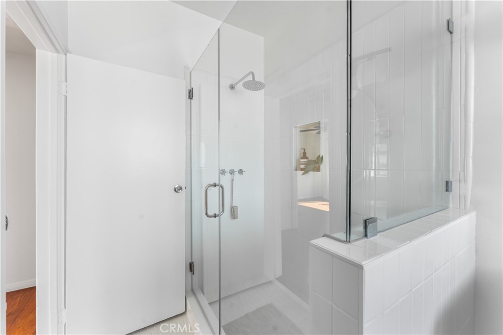 1178 Spence Street Los Angeles, CA 90023 - Photo 30 of 36 a bathroom with a shower