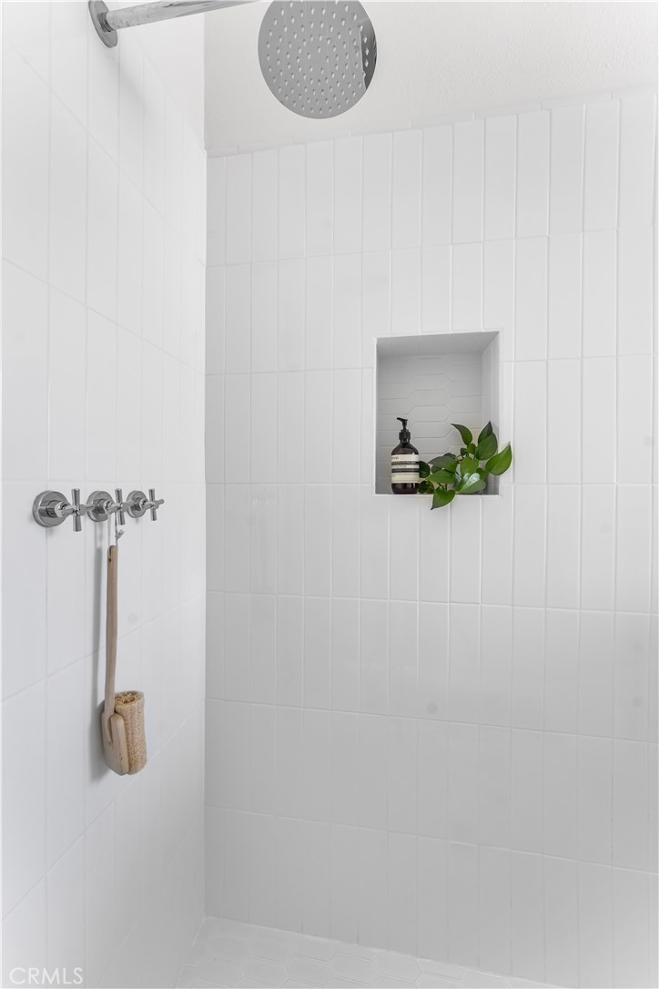1178 Spence Street Los Angeles, CA 90023 - Photo 31 of 36 a bathroom with a shower