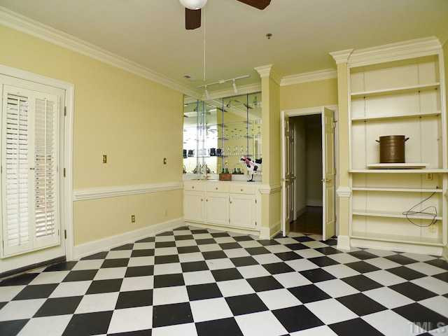 1612 Oberlin Road, Unit 7 Raleigh, NC 27608 - Photo 12 of 25 Wet bar and bookcases in sunny den.