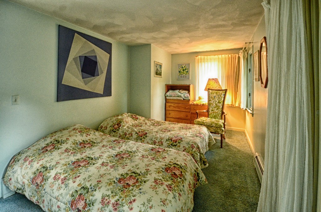 4 Pinewood Road Wareham, MA 02532 - Photo 15 of 30 a bedroom with a bed and balcony
