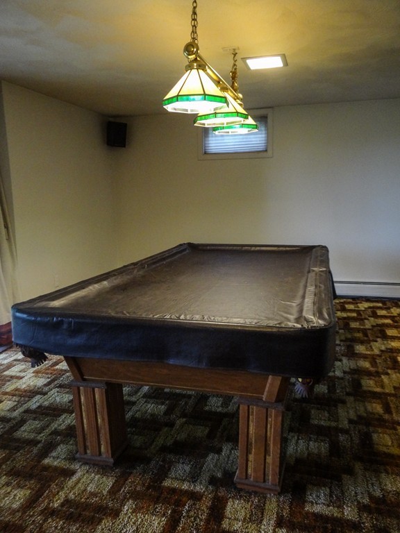 4 Pinewood Road Wareham, MA 02532 - Photo 21 of 30 a room with table and chairs