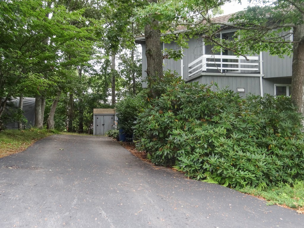 4 Pinewood Road Wareham, MA 02532 - Photo 24 of 30 a view of a house with a yard and sitting area