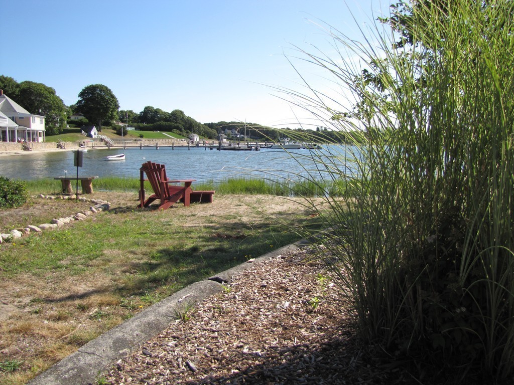 4 Pinewood Road Wareham, MA 02532 - Photo 30 of 30 a view of a lake with houses in the back