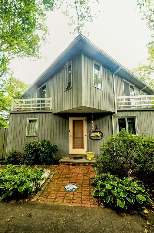 4 Pinewood Road Wareham, MA 02532 - Photo 3 of 30 a front view of a house with garden