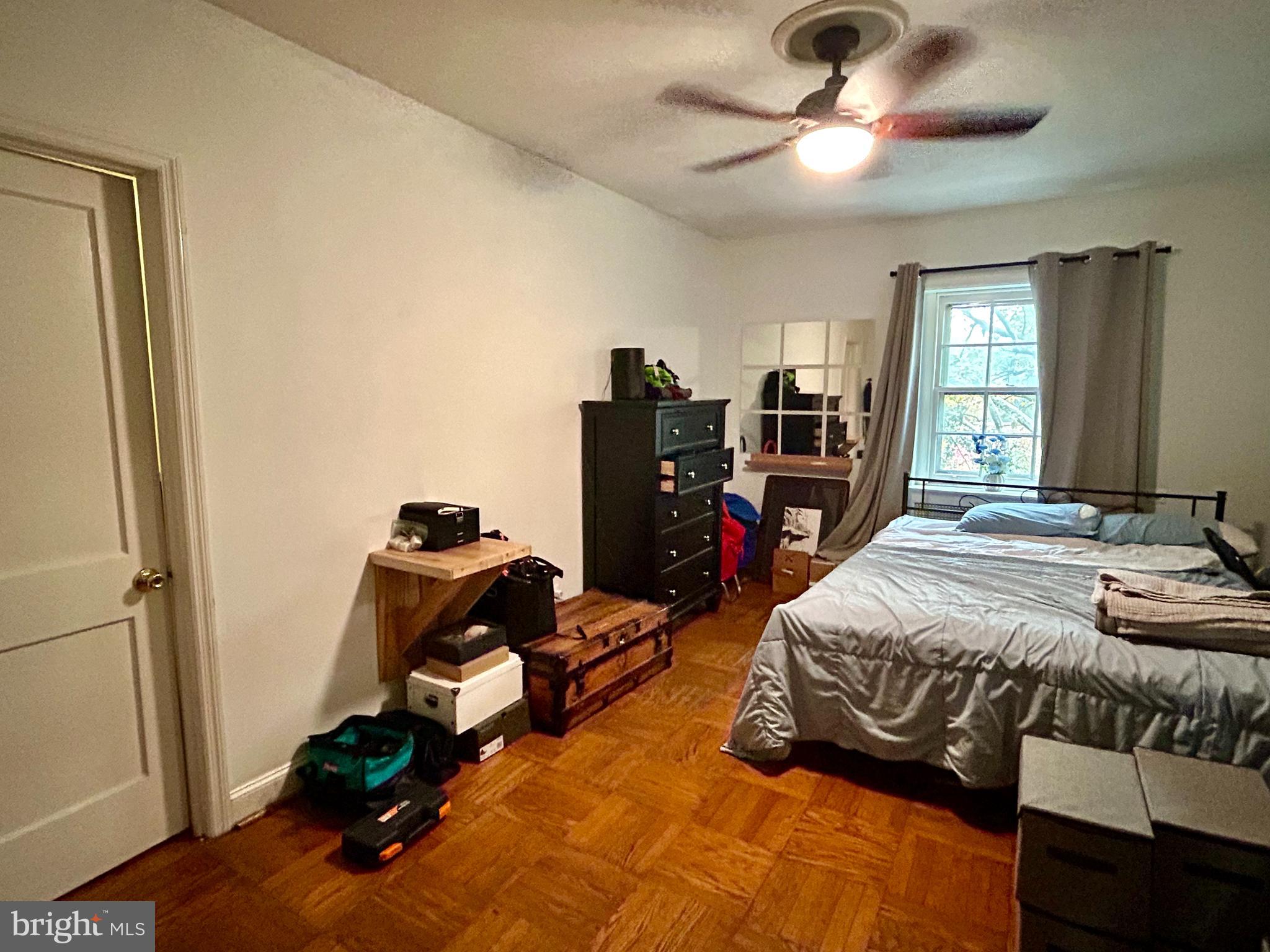 249 Pine Street, Unit 3 Philadelphia, PA 19106 - Photo 13 of 20 a bed room with bed and window