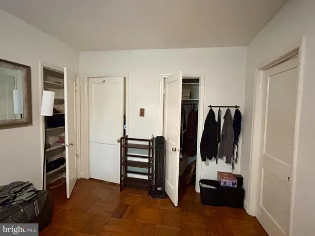 wooden floor and closet in a room