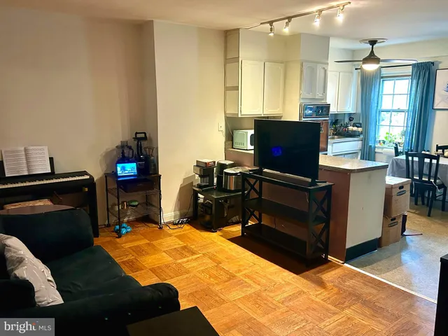 a room with furniture and a flat screen tv