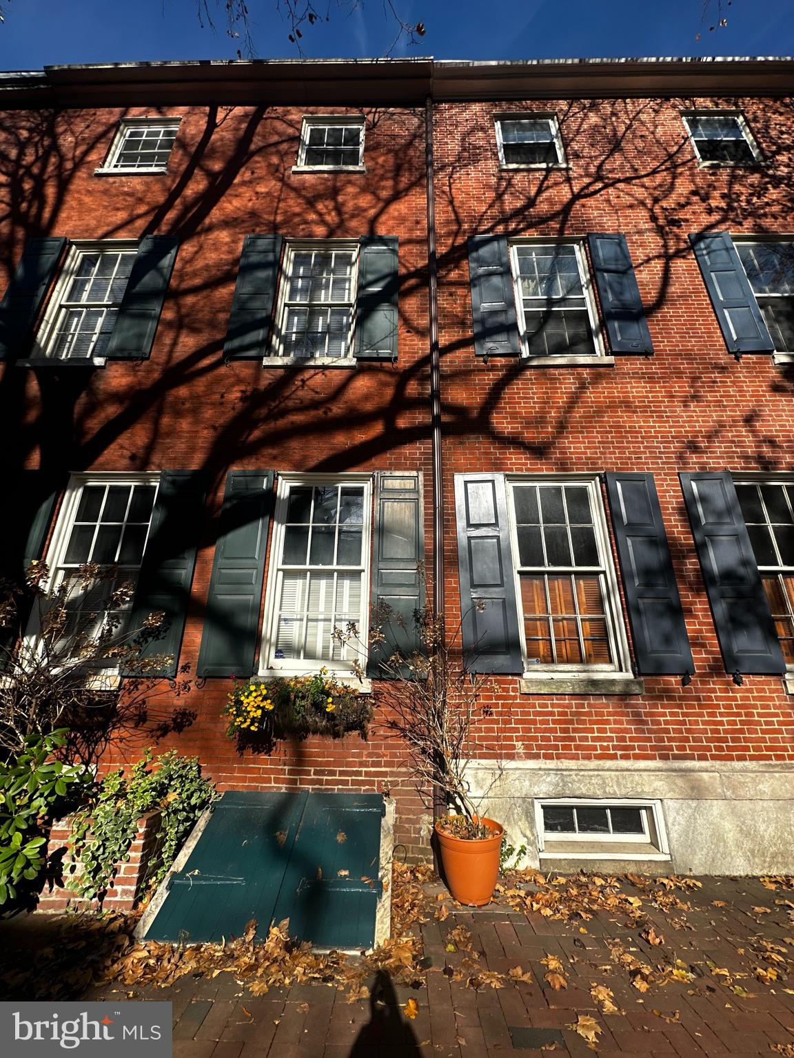 249 Pine Street, Unit 3 Philadelphia, PA 19106 - Photo 2 of 20 front view of a house with a swimming pool