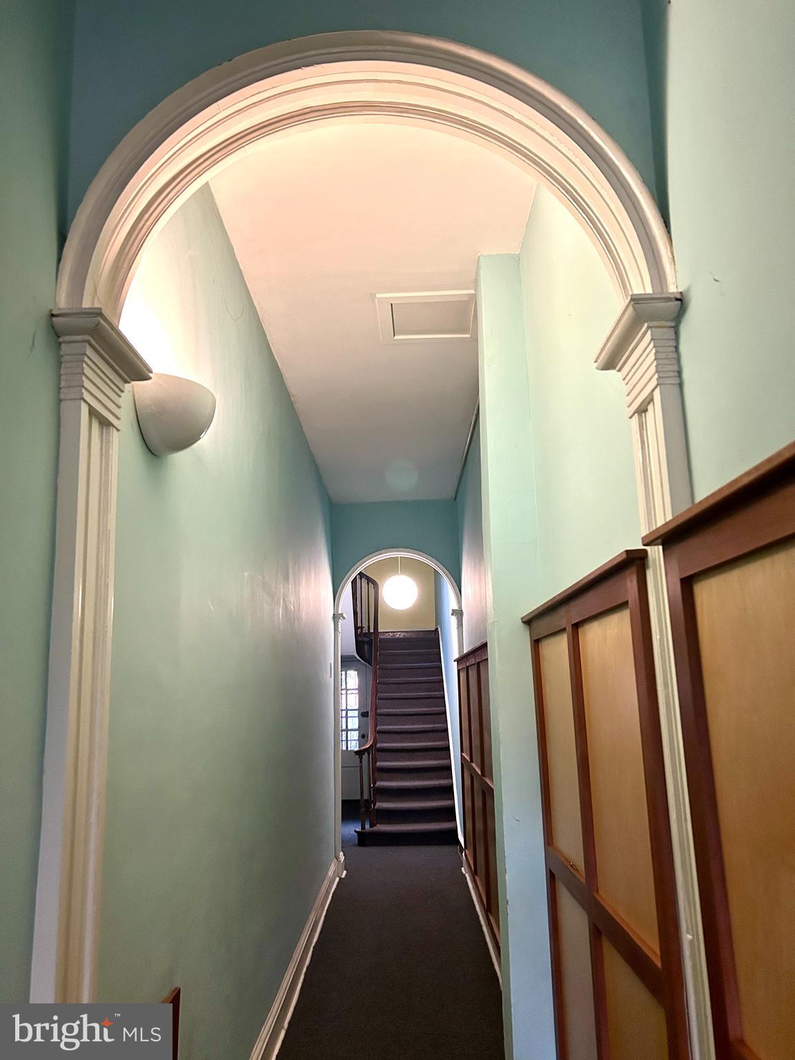 249 Pine Street, Unit 3 Philadelphia, PA 19106 - Photo 3 of 20 a view of a hallway with wooden floor