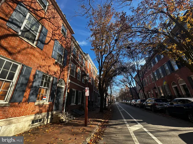 a view of a street with houses