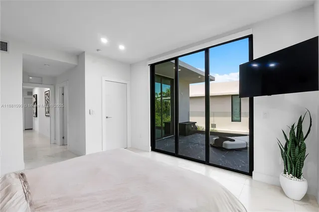 a view of living room with furniture and a window