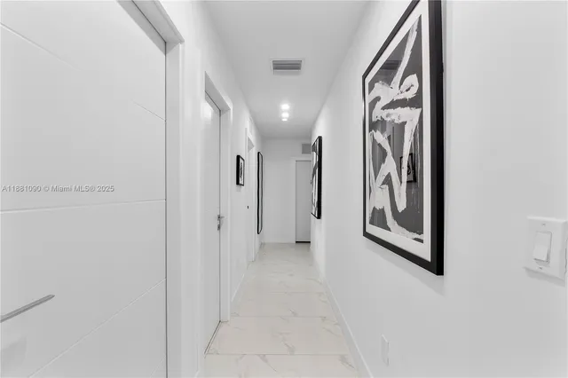 a view of house with entryway and stairs