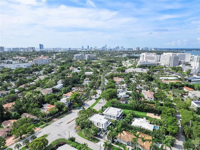 an aerial view of a house with a garden