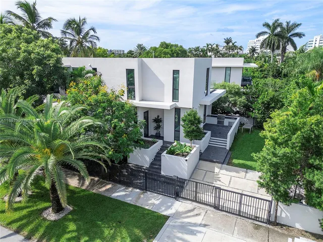 a living room with furniture and a chair