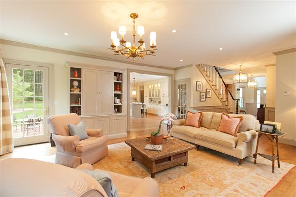 162 Independence Road Concord, MA 01742 - Photo 5 of 24 a living room with furniture chandelier and a table