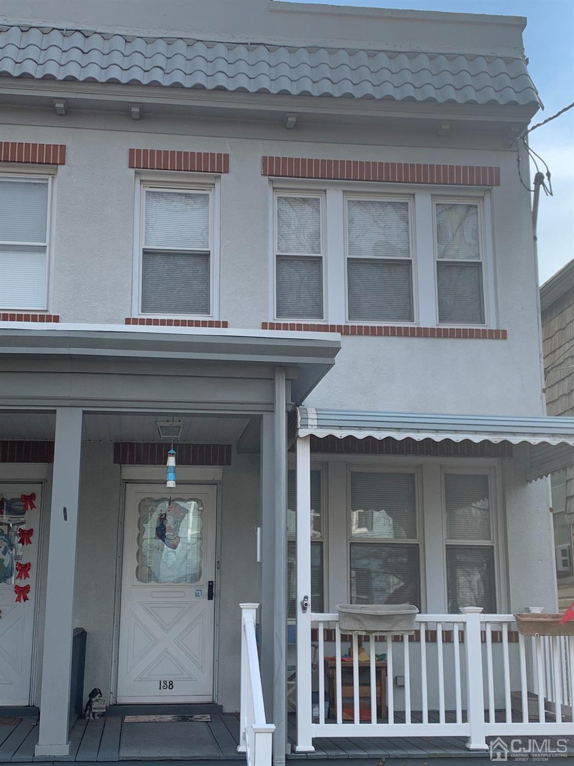 138 Rector Street Perth Amboy, NJ 08861 - Photo 2 of 15 a front view of a house