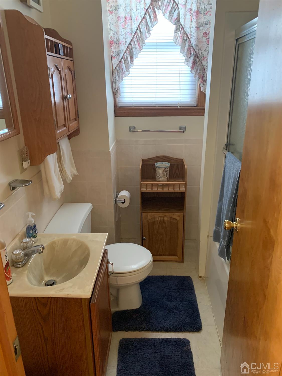 138 Rector Street Perth Amboy, NJ 08861 - Photo 13 of 15 a bathroom with a sink toilet and shower