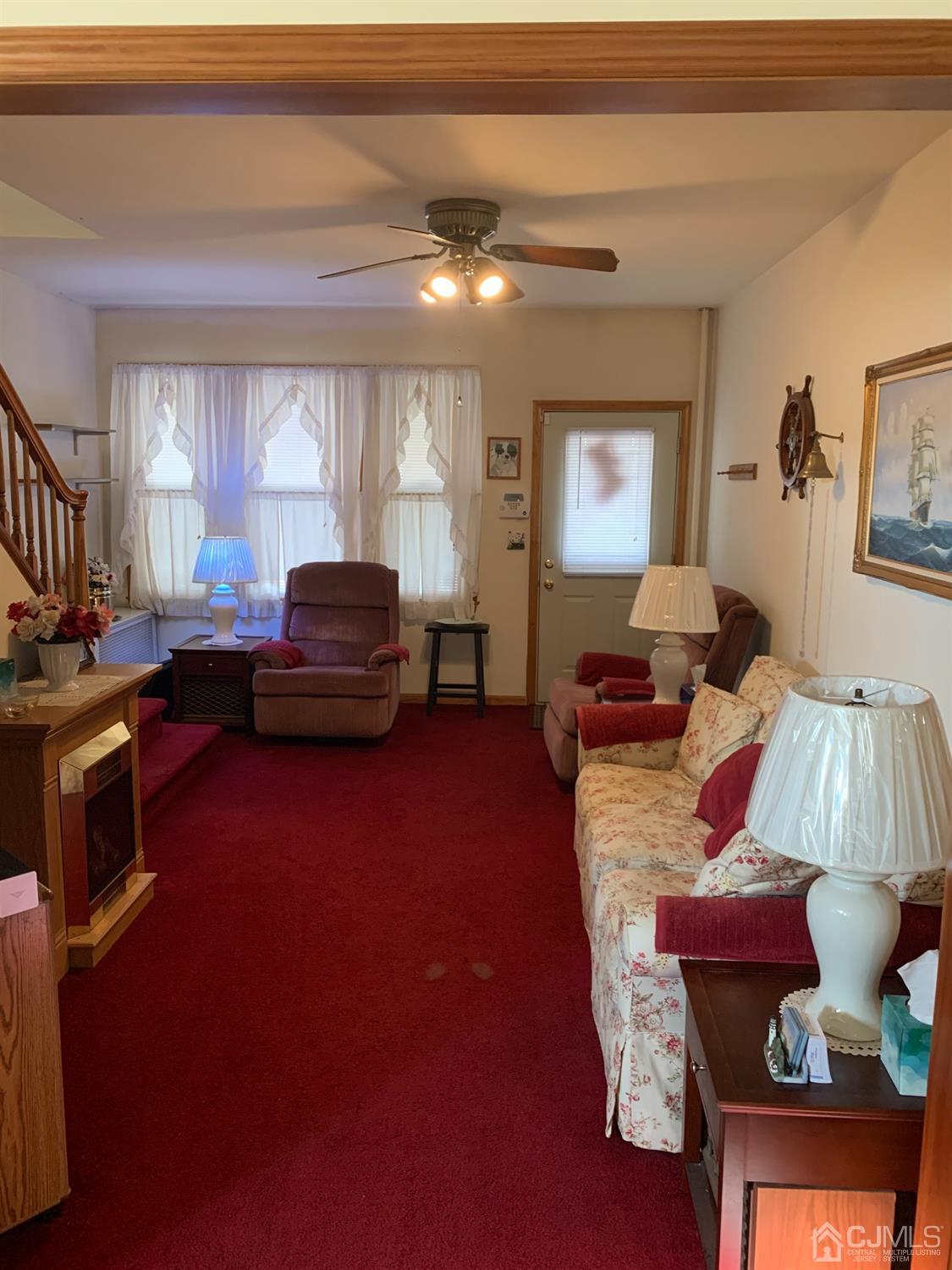 138 Rector Street Perth Amboy, NJ 08861 - Photo 4 of 15 a living room with furniture and a window